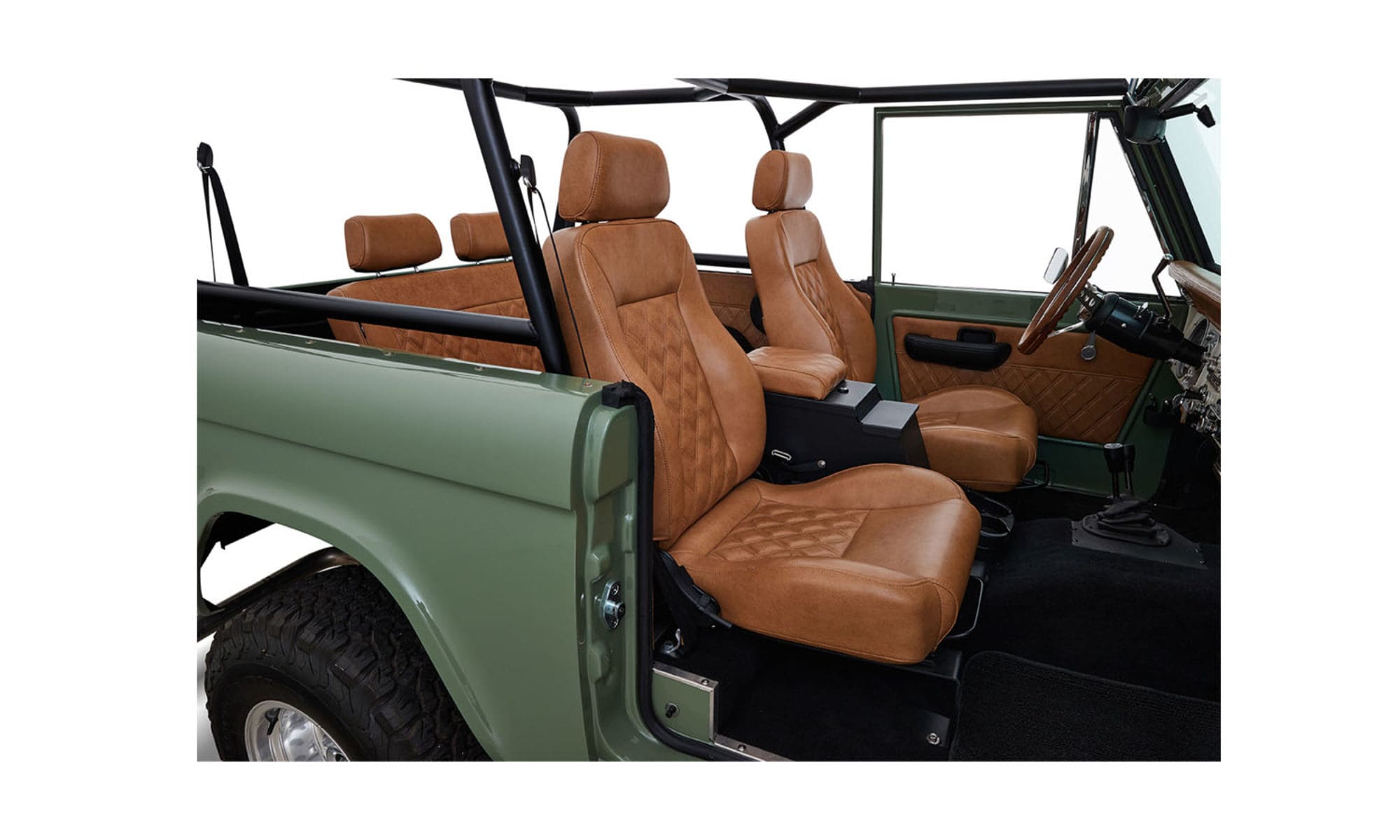 1973 Classic Ford Broncos Coyote Series in Boxwood Green with Whiskey Interior with family roll cage muirfield