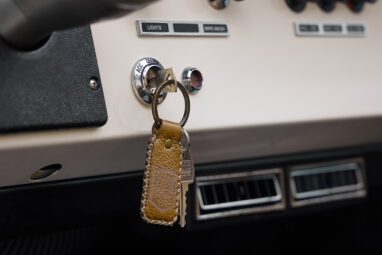 1973 Ford Bronco in Brittany Blue over Whiskey leather key