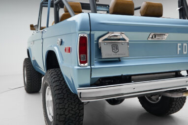 1973 Ford Bronco in Brittany Blue over Whiskey leather rear angle
