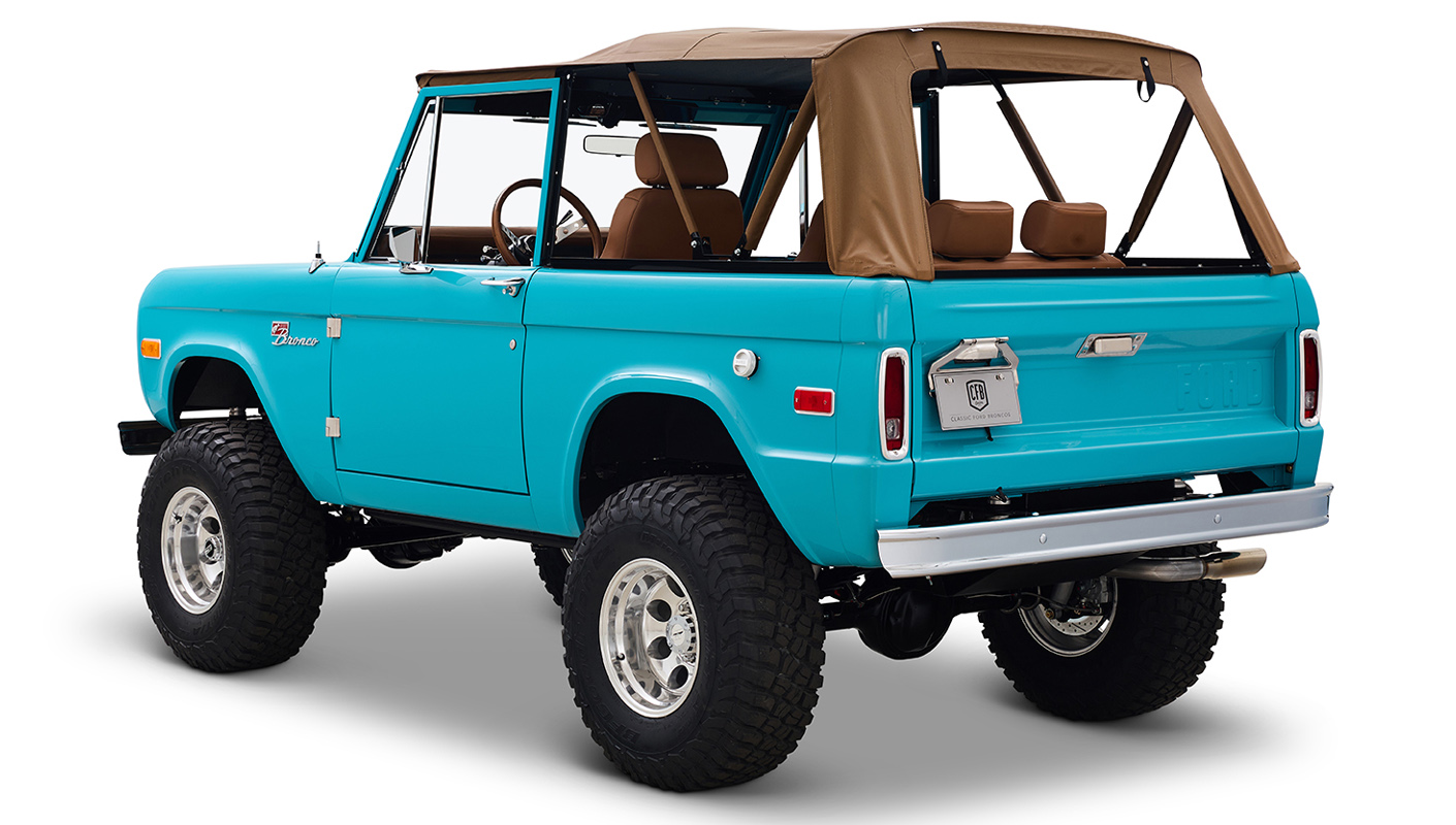 Ford Bronco 1969 Peacock Blue 302 Series with Tan Soft Top and Custom Leather Diamond Stitch Interior