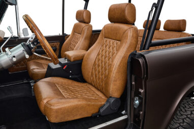 Ford Bronco 1970 in Matte Macadamia Brown with whiskey leather interior and black wheels Wooden Steering Wheel diamond stitch