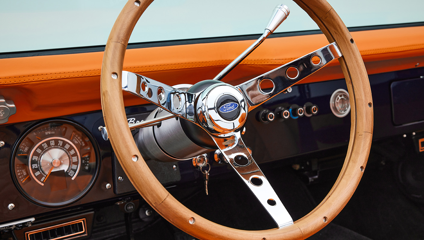 1971 Ford Bronco Coyote Series in Rolls Royce Blue over Orange Custom Interior 3rd Gen Coyote 5.0L Engine Steering Wheel Detail