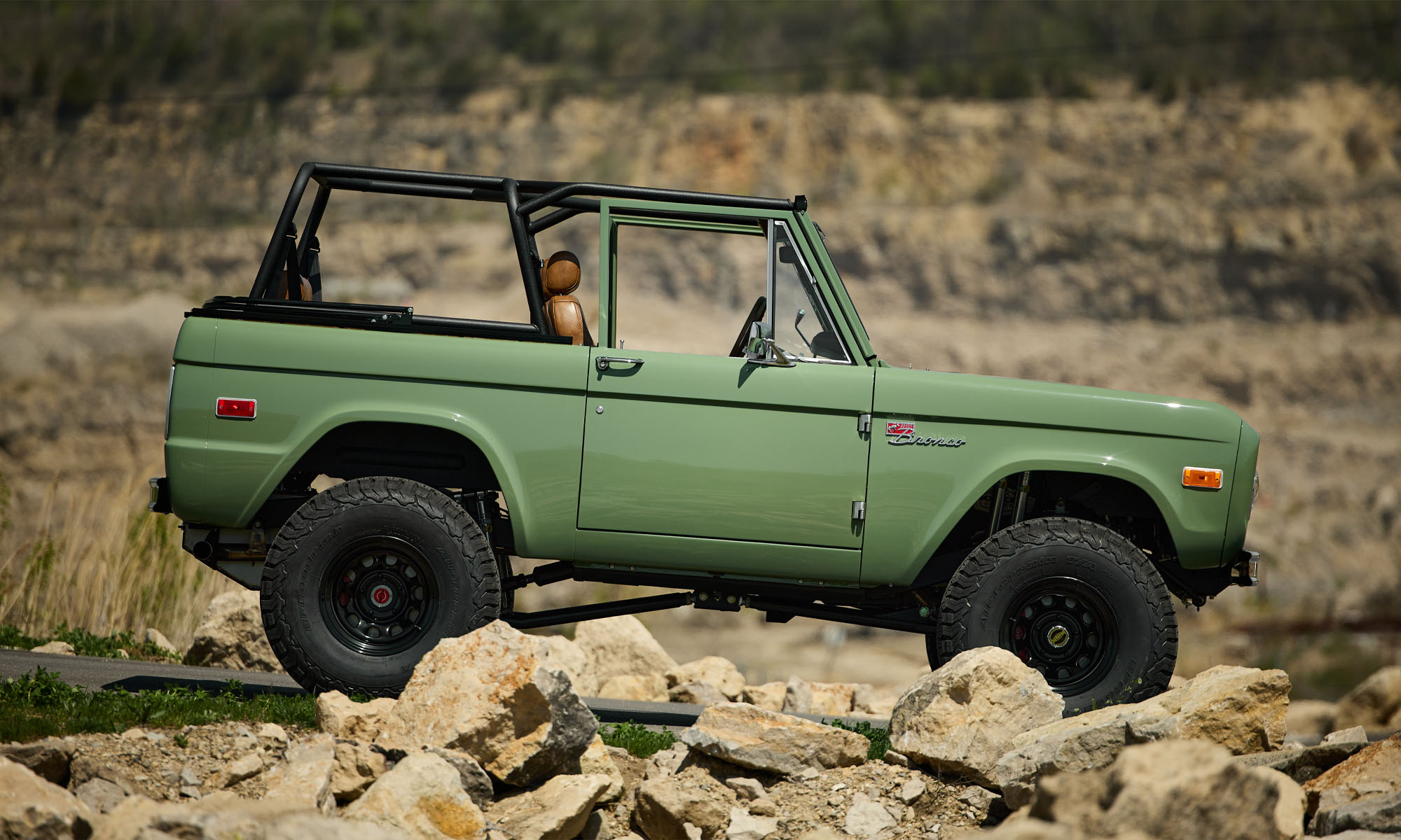 1973 Classic Ford Broncos Coyote Series in Boxwood Green with Whiskey Interior with family roll cage muirfield