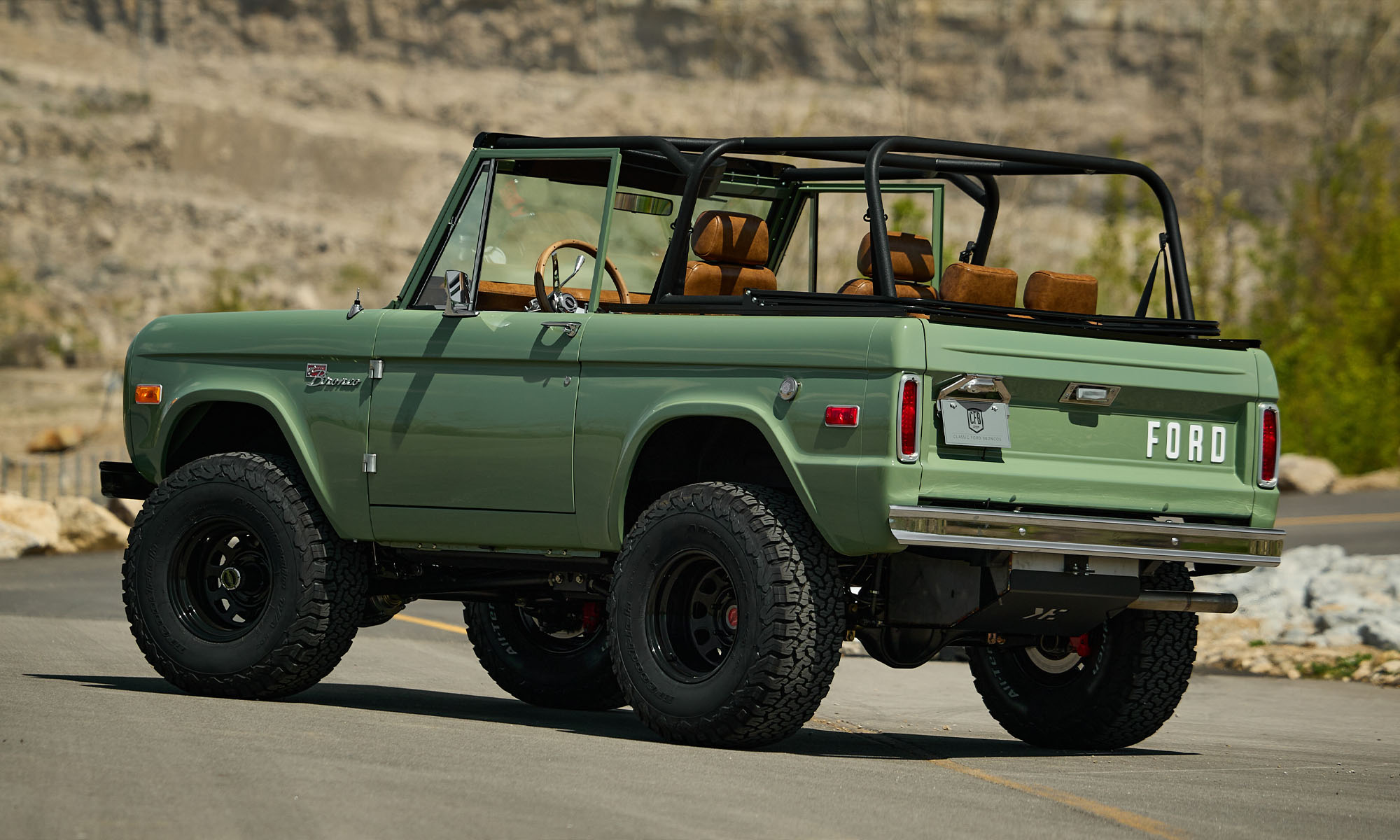 1973 Classic Ford Broncos Coyote Series in Boxwood Green with Whiskey Interior with family roll cage muirfield