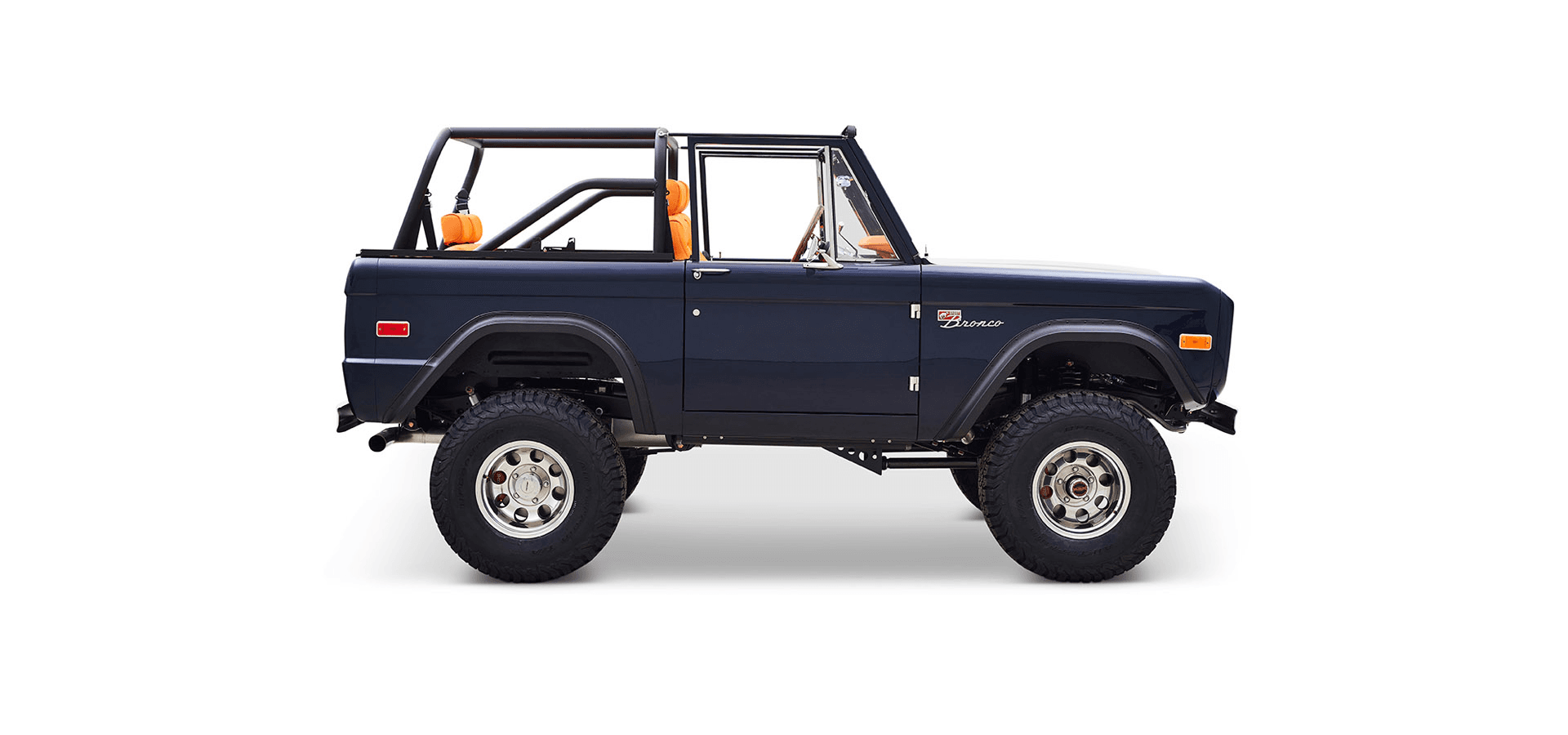 1974 Classic Ford Bronco Coyote Series Rolls Royce Blue with Orange Diamond Stitch Interior Alys Beach