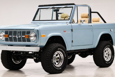 1966 Brittany Blue Classic Ford Bronco with custom diamond stitch interior and factory roll cage