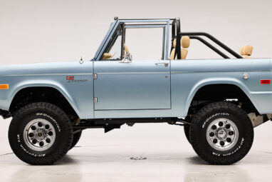 1966 Brittany Blue Classic Ford Bronco with custom diamond stitch interior and factory roll cage