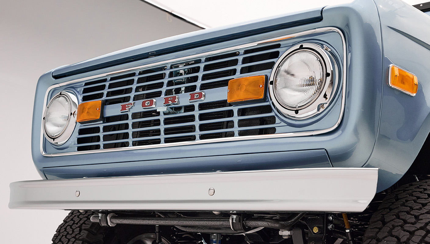 1966 Brittany Blue Classic Ford Bronco with custom diamond stitch interior and color matched grille