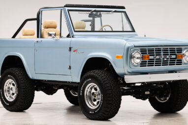 1966 Brittany Blue Classic Ford Bronco with custom diamond stitch interior and factory roll cage