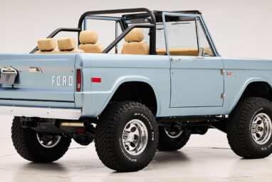 1966 Brittany Blue Classic Ford Bronco with custom diamond stitch interior and factory roll cage