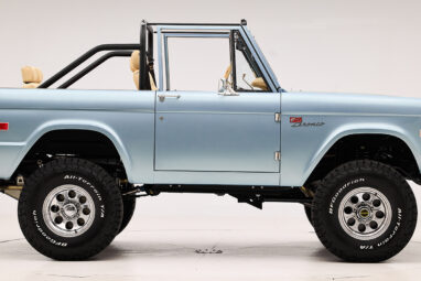 1966 Brittany Blue Classic Ford Bronco with custom diamond stitch interior and factory roll cage