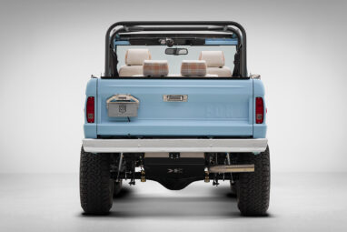 A 1970 Classic Ford Broncos coyote series in frozen blue over custom white rock leather interior, family cage 2, factory chrome bumpers