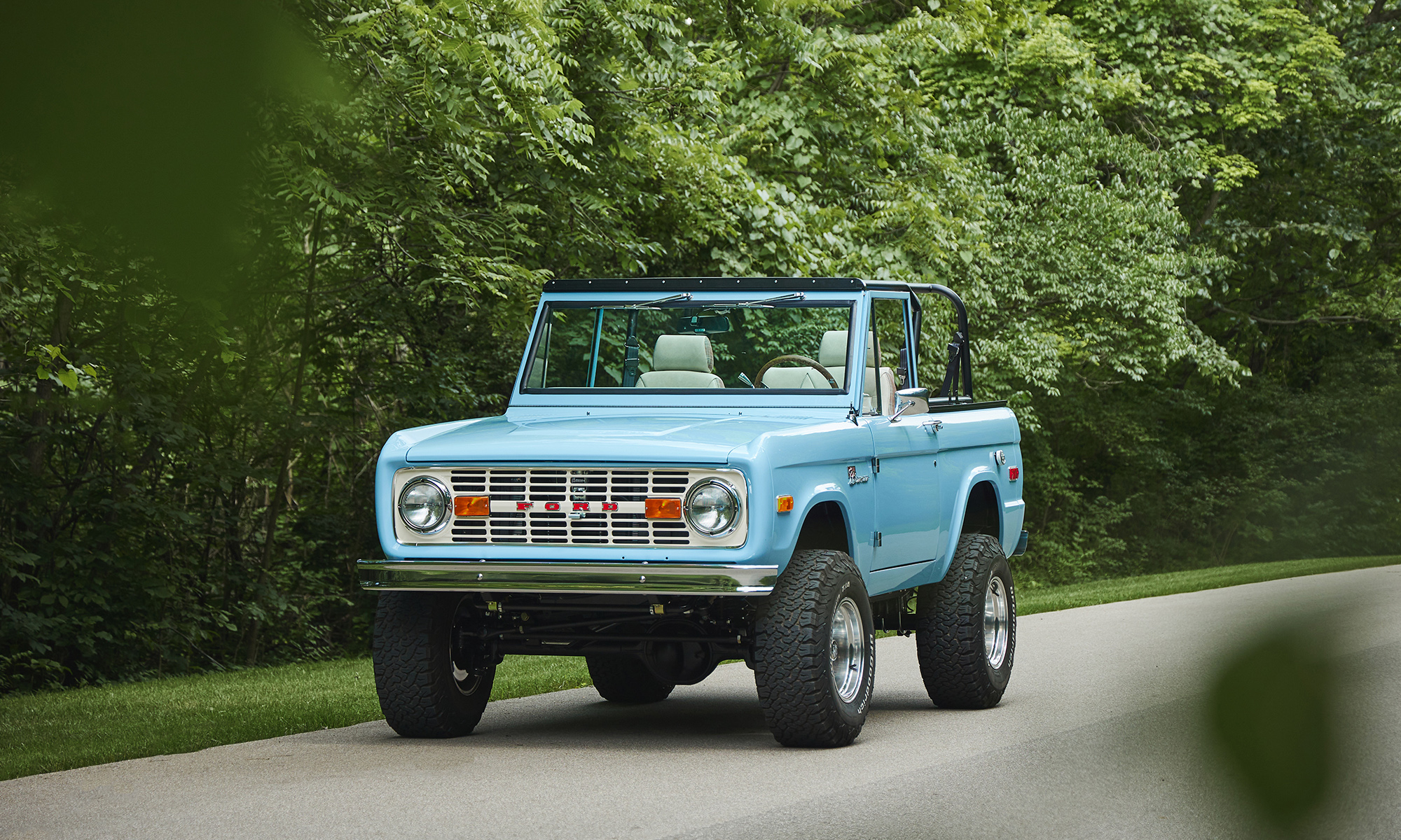 1970 classic ford bronco coyote series v8 painted frozen blue with white rock leather and tartan plaid interior