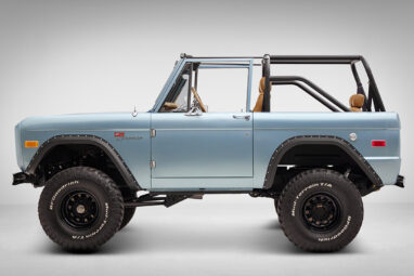 1976 Ford Bronco in Brittany Blue with whiskey diamond stitch driver side