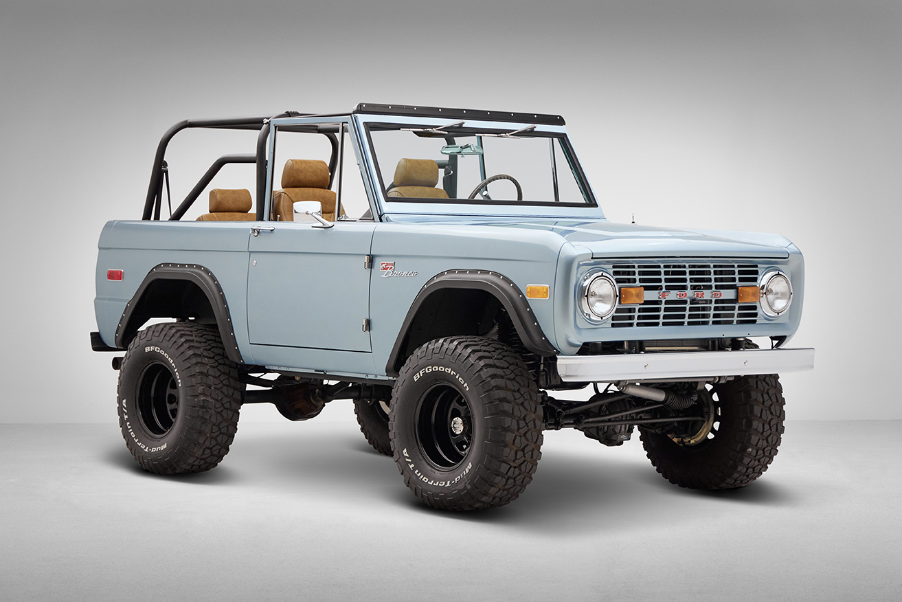 1976 Ford Bronco in Brittany Blue with whiskey diamond stitch front angle