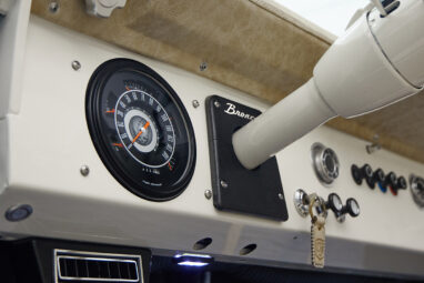 A 1976 Classic Ford Bronco is Frozen Blue over White Rock leather with custom grateful dead gauge