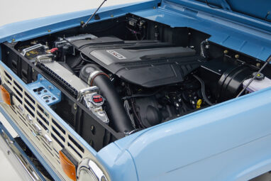 A 1976 Classic Ford Bronco is Frozen Blue over White Rock leather ford coyote motor