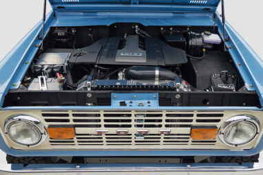 A 1976 Classic Ford Bronco is Frozen Blue over White Rock leather ford coyote motor