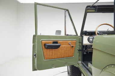 1976 classic ford bronco in boxwood green with ball glove leather door panel