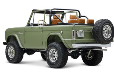 1976 classic ford bronco in boxwood green with ball glove leather driver rear angle