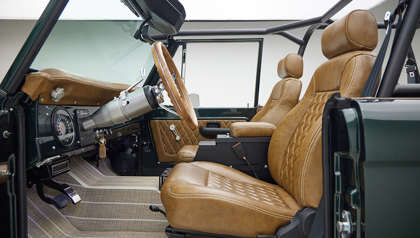 1966 ford bronco in highland green with whiskey leather interior driver interior