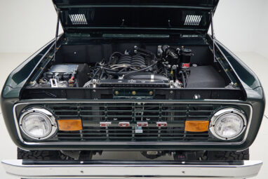 1966 ford bronco in highland green with whiskey leather interior motor front