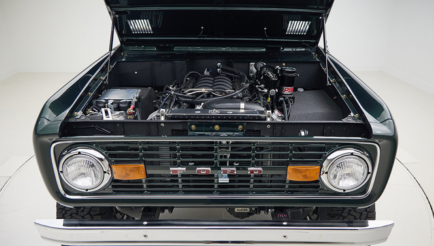 1966 ford bronco in highland green with whiskey leather interior motor front