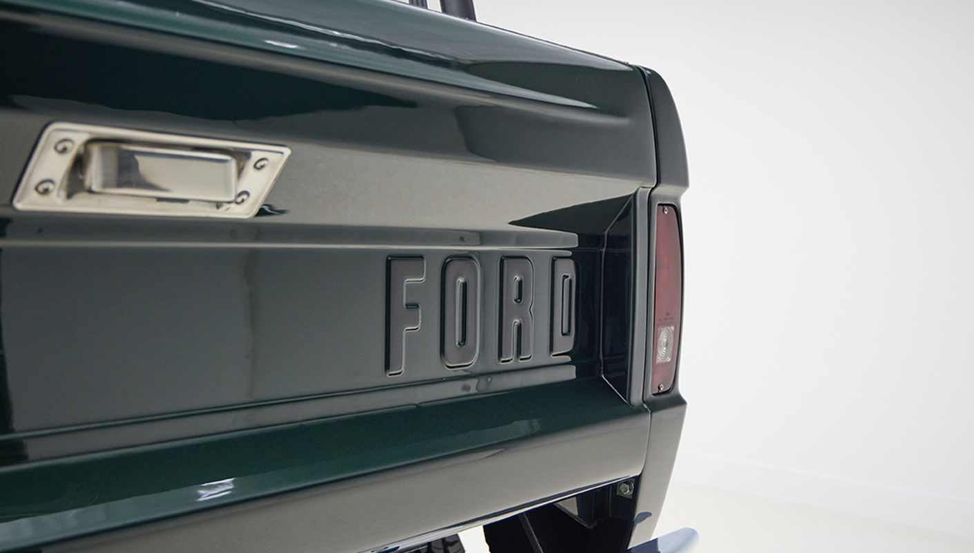 1966 ford bronco in highland green with whiskey leather interior ford badge