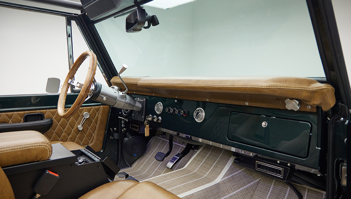 1966 ford bronco in highland green with whiskey leather interior passenger dash