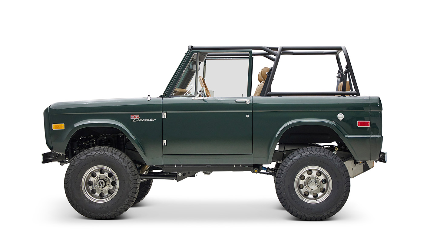 1966 ford bronco in highland green with whiskey leather interior driver profile