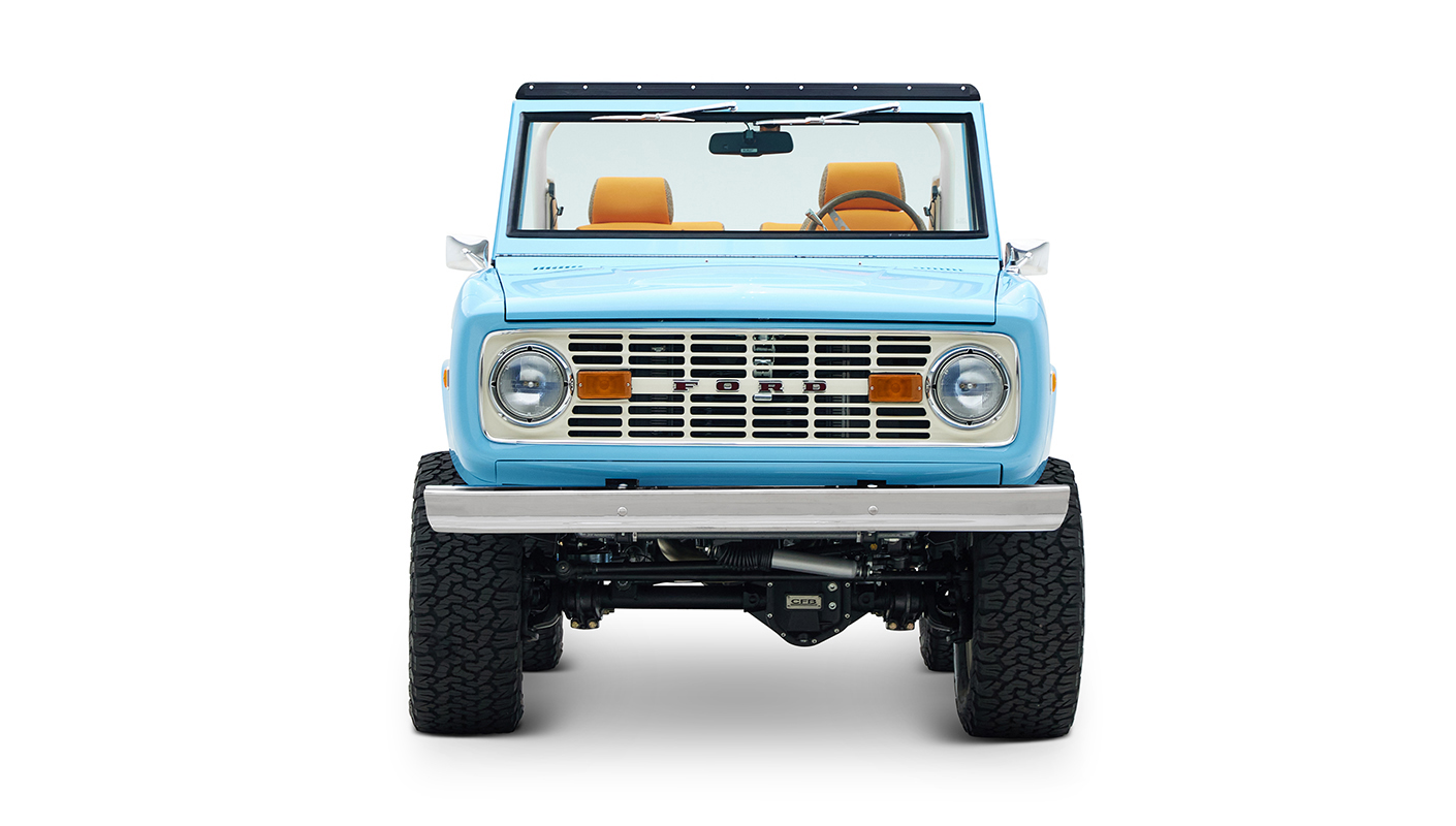 1973 Classic Ford Bronco in frozen blue with rolls royce orange leather and alpaca interior front