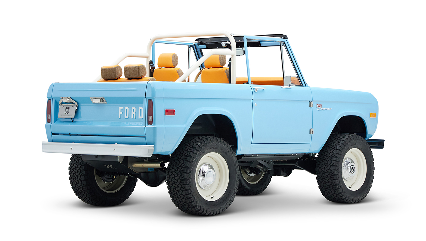 1973 Classic Ford Bronco in frozen blue with rolls royce orange leather and alpaca interior passenger rear