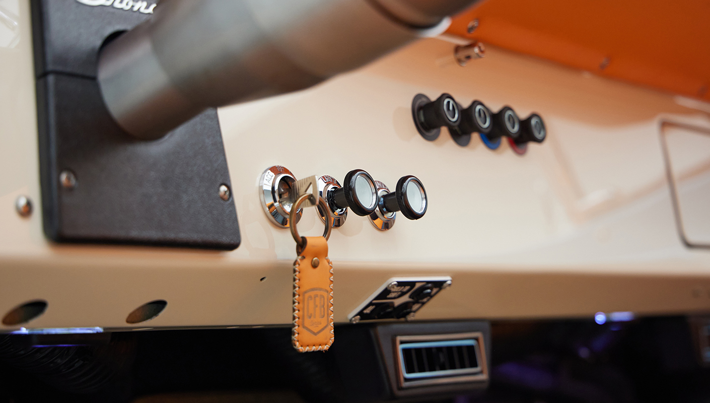 1973 Classic Ford Bronco in frozen blue with rolls royce orange leather and alpaca interior key