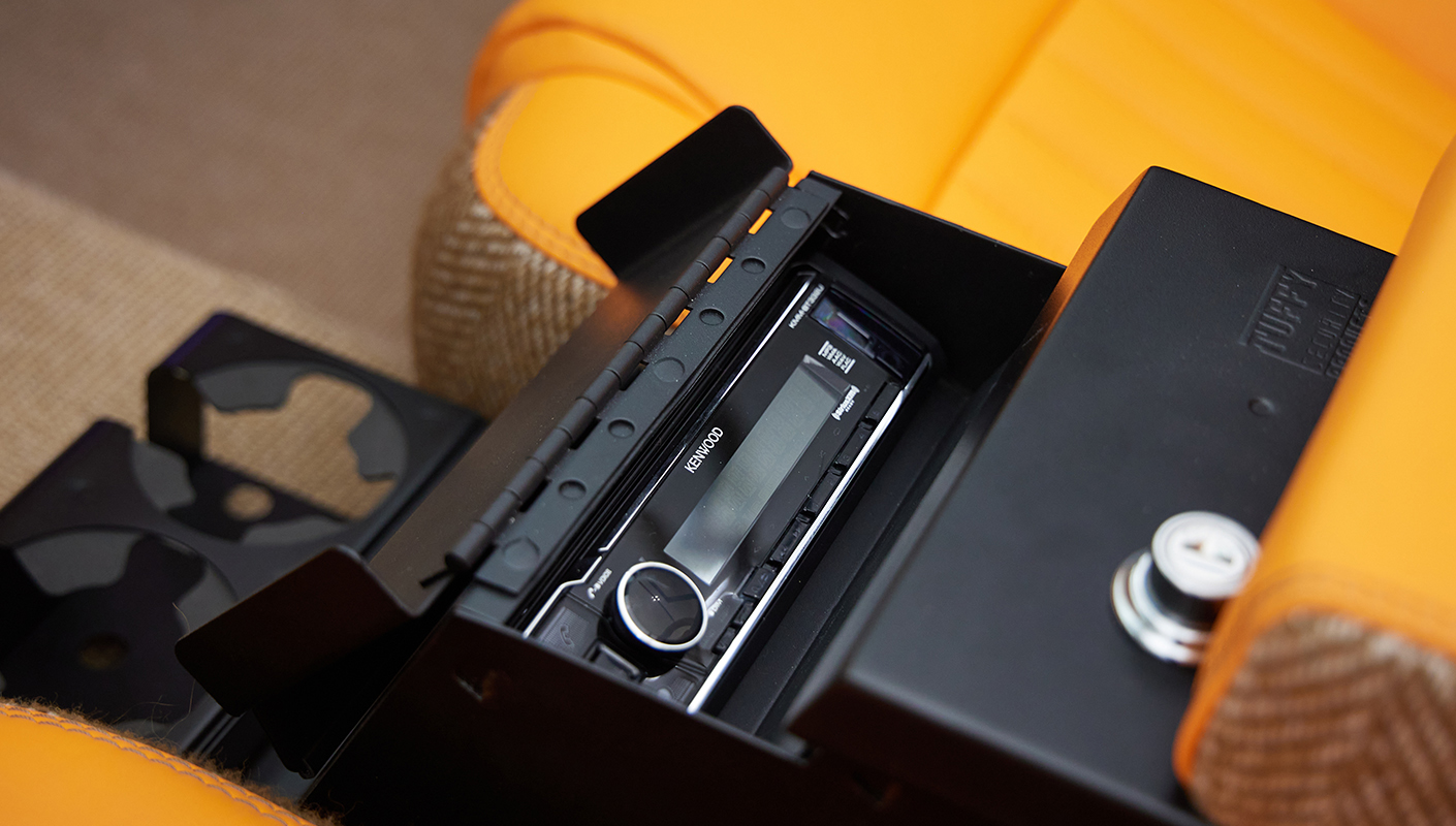 1973 Classic Ford Bronco in frozen blue with rolls royce orange leather and alpaca interior stereo