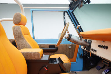 1973 Classic Ford Bronco in frozen blue with rolls royce orange leather and alpaca interior interior detail