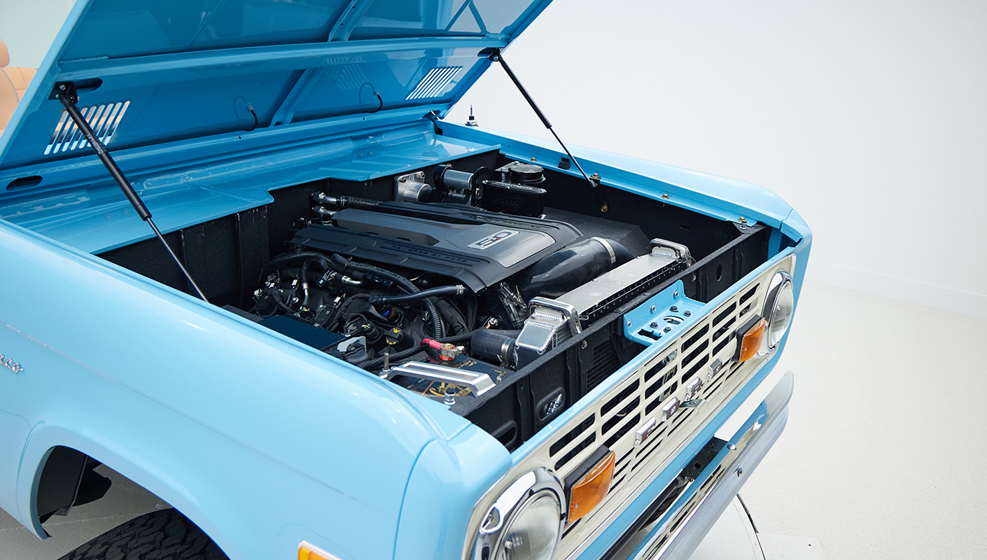 1973 Classic Ford Bronco in frozen blue with rolls royce orange leather and alpaca interior passenger motor