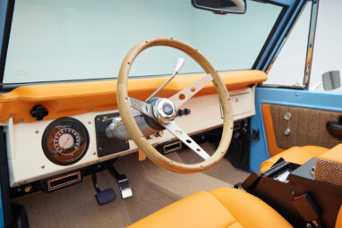 1973 Classic Ford Bronco in frozen blue with rolls royce orange leather and alpaca interior steering wheel