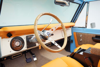 1973 Classic Ford Bronco in frozen blue with rolls royce orange leather and alpaca interior panel