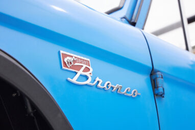 1976 classic ford bronco in blue patina paint with whiskey leather interior emblem
