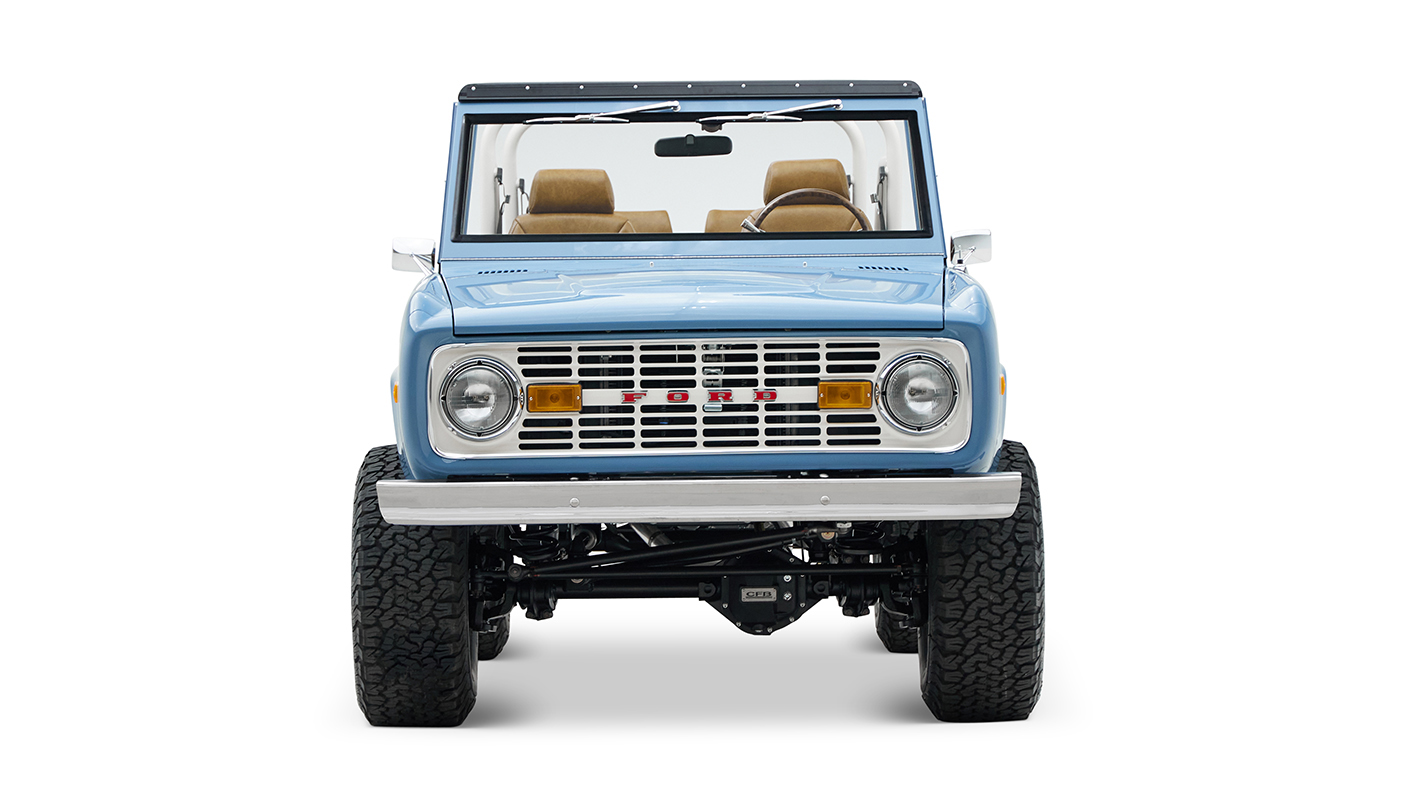 1974 classic ford bronco in stars & stripes blue with whiskey leather front profile