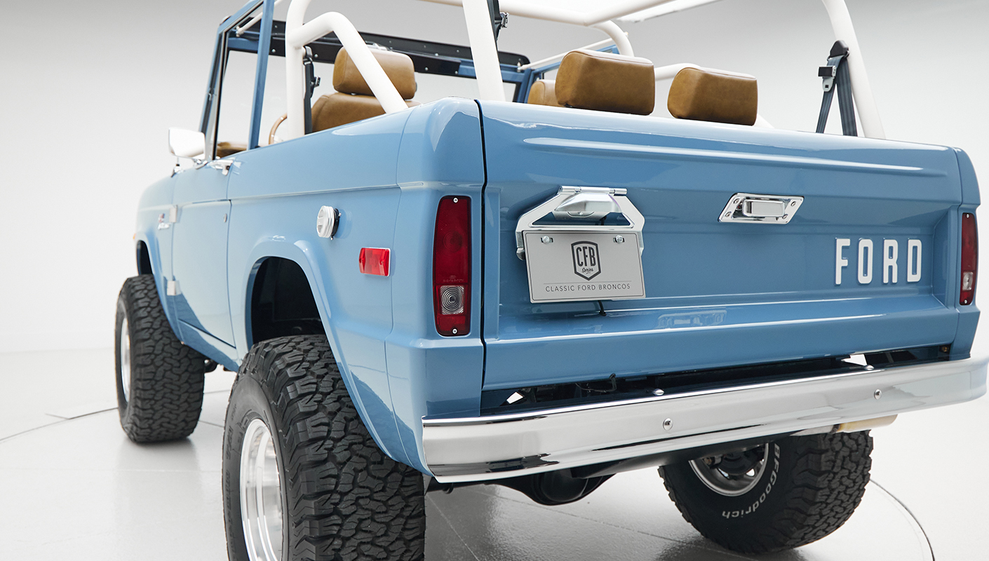 1974 classic ford bronco in stars & stripes blue with whiskey leather plate